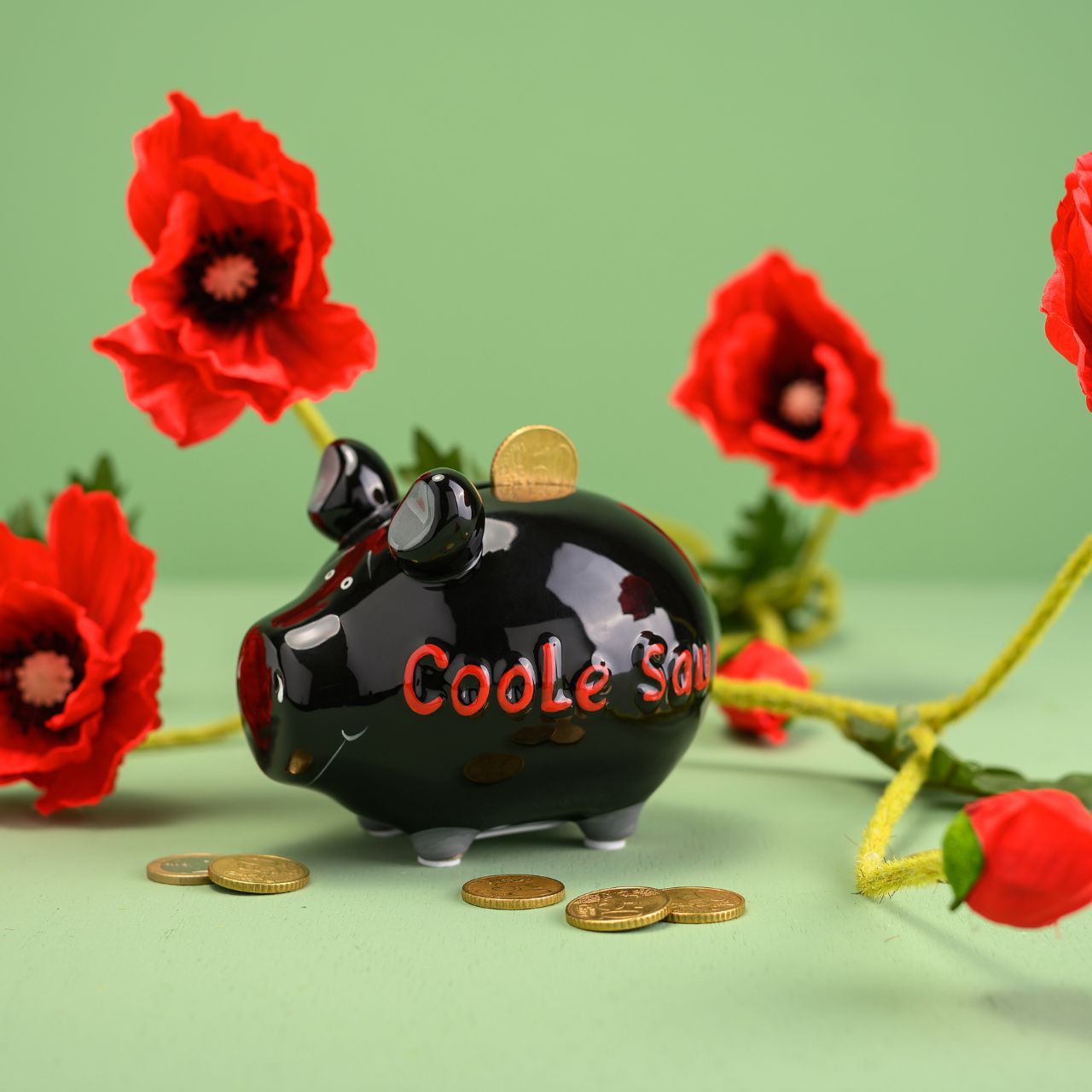 Salvadanaio KCG "Cool pig" in ceramica, nero/rosa (L/H/D) 12,5x9x9cm Piccolo maiale Salvadanaio KCG "Cool pig" in ceramica, nero/rosa (L/H/D) 12,5x9x9cm Piccolo maiale