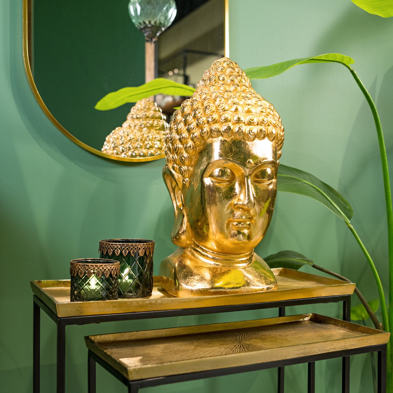 Tête de bouddha en magnésie dorée, L27x P25 x H47 cm Tête de bouddha en magnésie dorée, L27x P25 x H47 cm