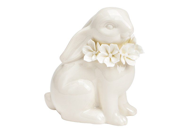 Bunny sitting with floral decoration made of porcelain (W/H/D) 10x12x6cm