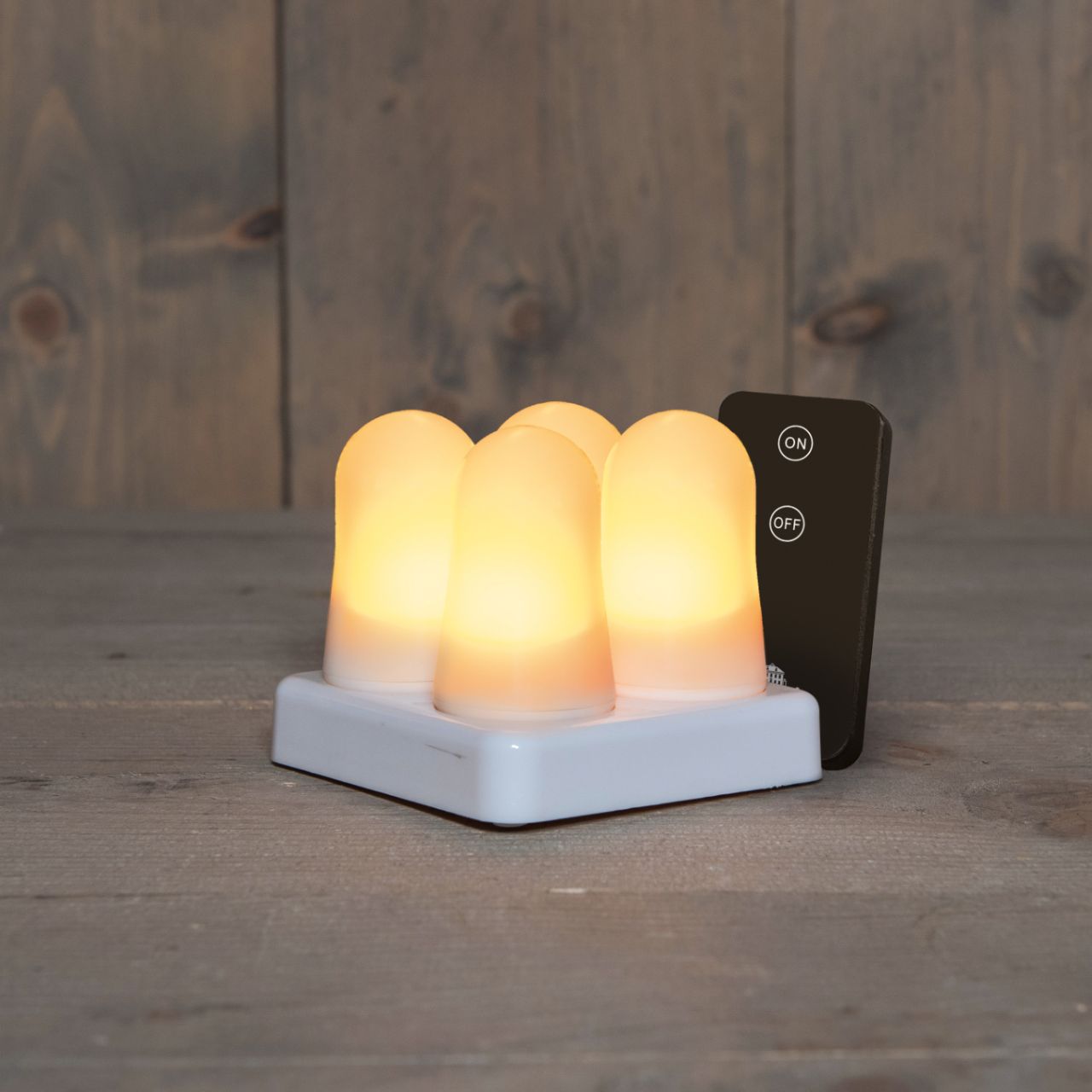 Miniflamme 4St. wiederaufladbar IP20 mit Fernbedienung, Ladestation und USB-Zuleitung Dia3,8cm x H 6,3cm Weiß Nachtlicht, Beleuchtung, LED, Tischlampe, Beleuchtungskopf