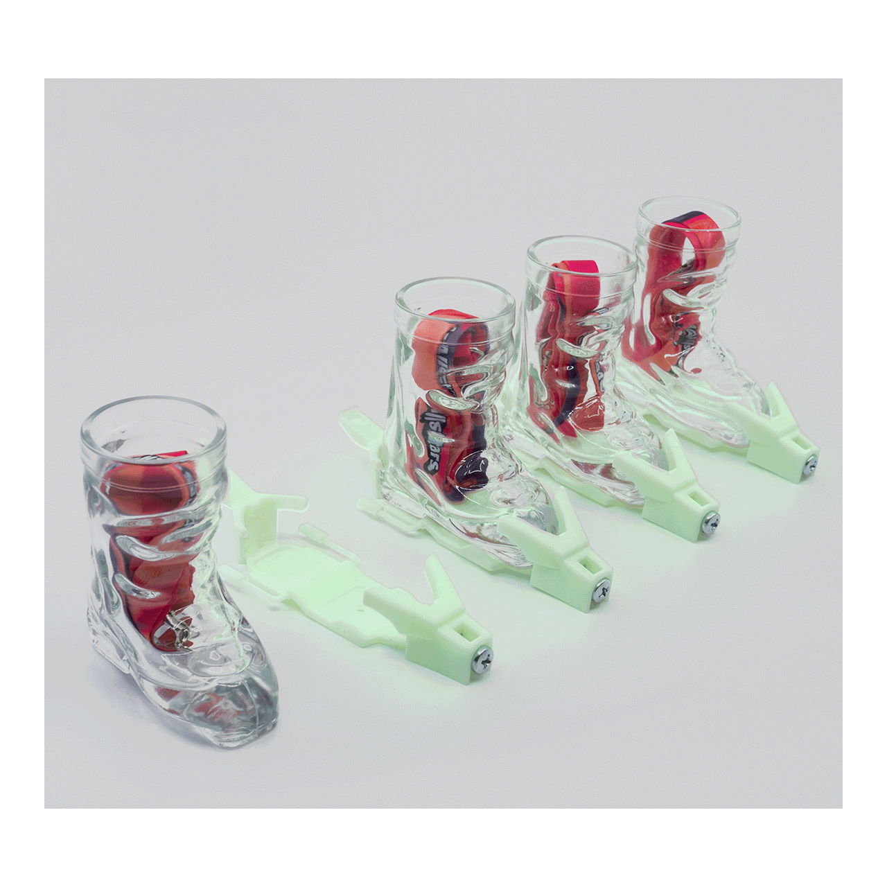 Apres-Allstars ski boot shot glass 4cl with binding/lanyards made of glass with glow, set of 4, white (W/H/D) 69x36x74mm/110x38x24mm Apres-Allstars ski boot shot glass 4cl with binding/lanyards made of glass with glow, set of 4, white (W/H/D) 69x36x74mm/110x38x24mm