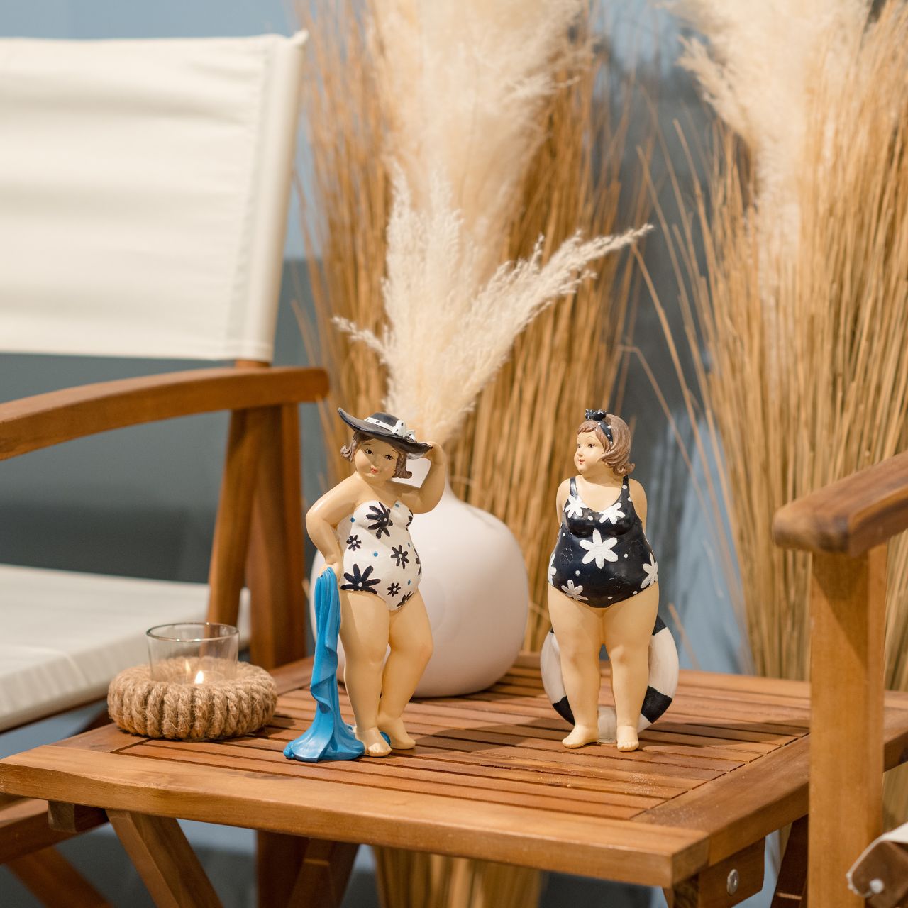 Frau im Badeanzug aus Poly, 2-fach sortiert, B9 x T6 x H20 cm Frau im Badeanzug aus Poly, 2-fach sortiert, B9 x T6 x H20 cm