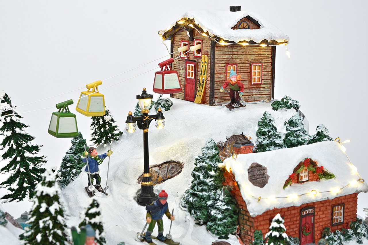 Village, movable, with music, LED-lit, with adapter, made of colorful polyethylene (W/H/D) 51x30x42 cm Weihnachtsdorf, Winterlandschaft, Seilbahn, LED-Beleuchtung, Miniaturhäuser